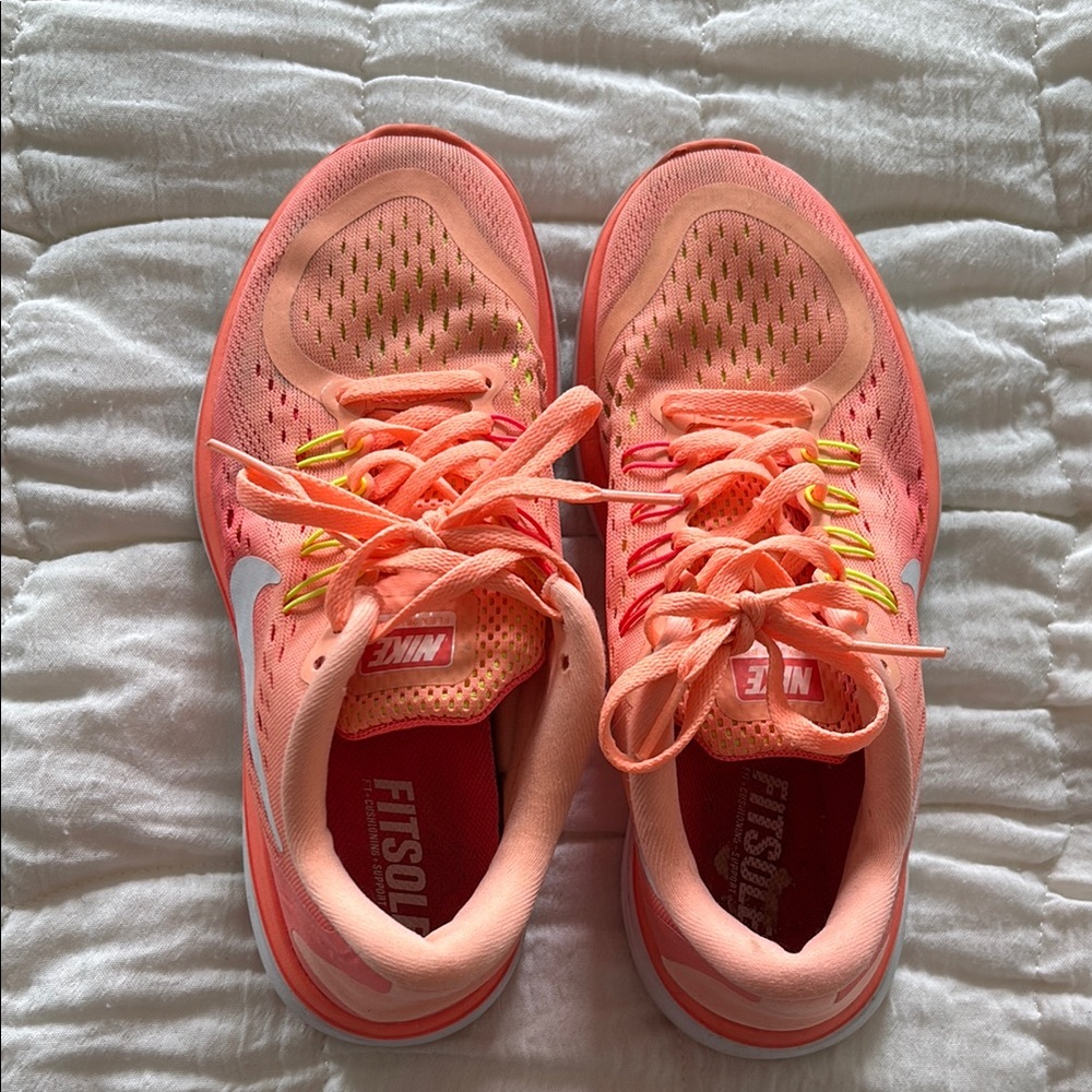 Nike Coral and Yellow Athletic Shoes